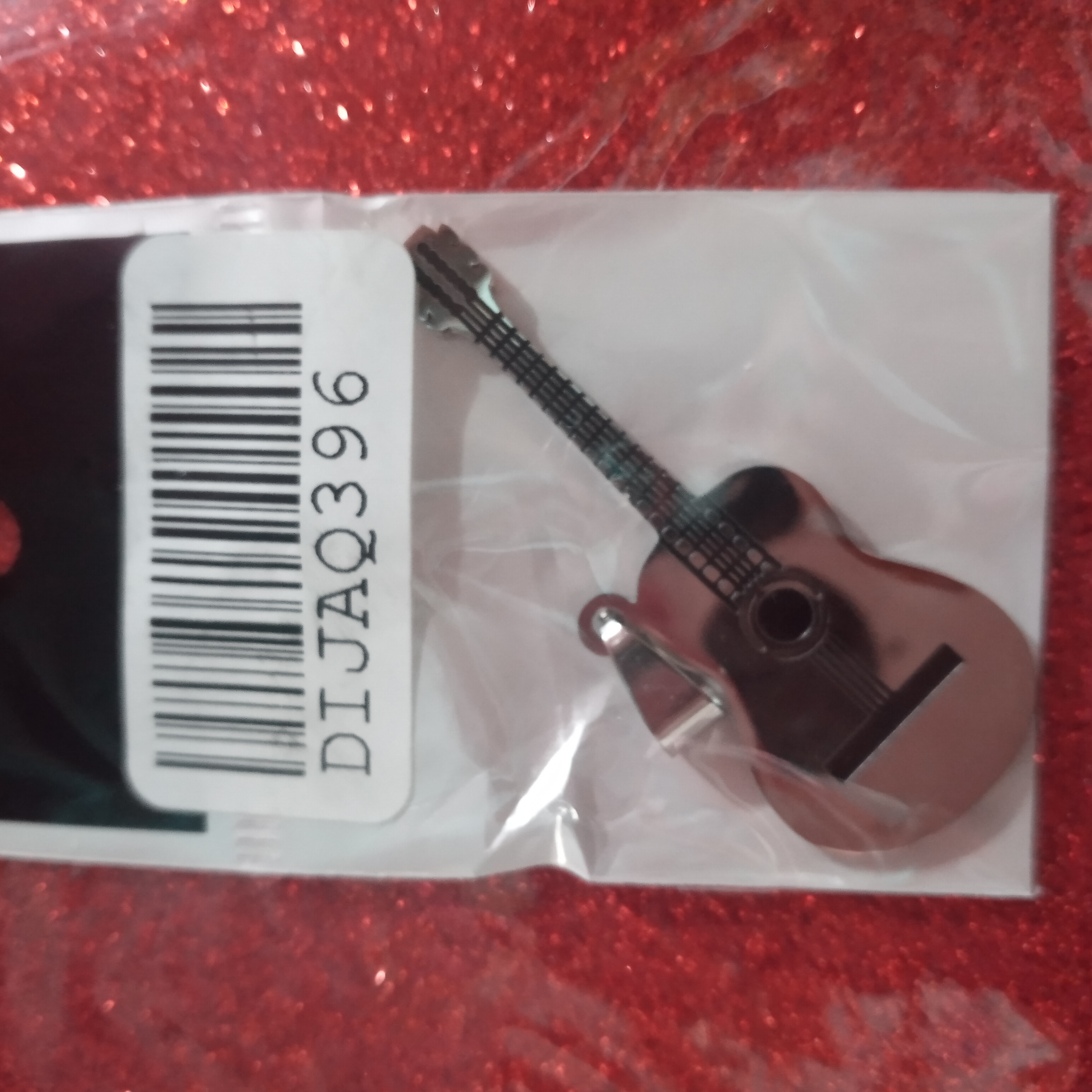 Dije guitarra