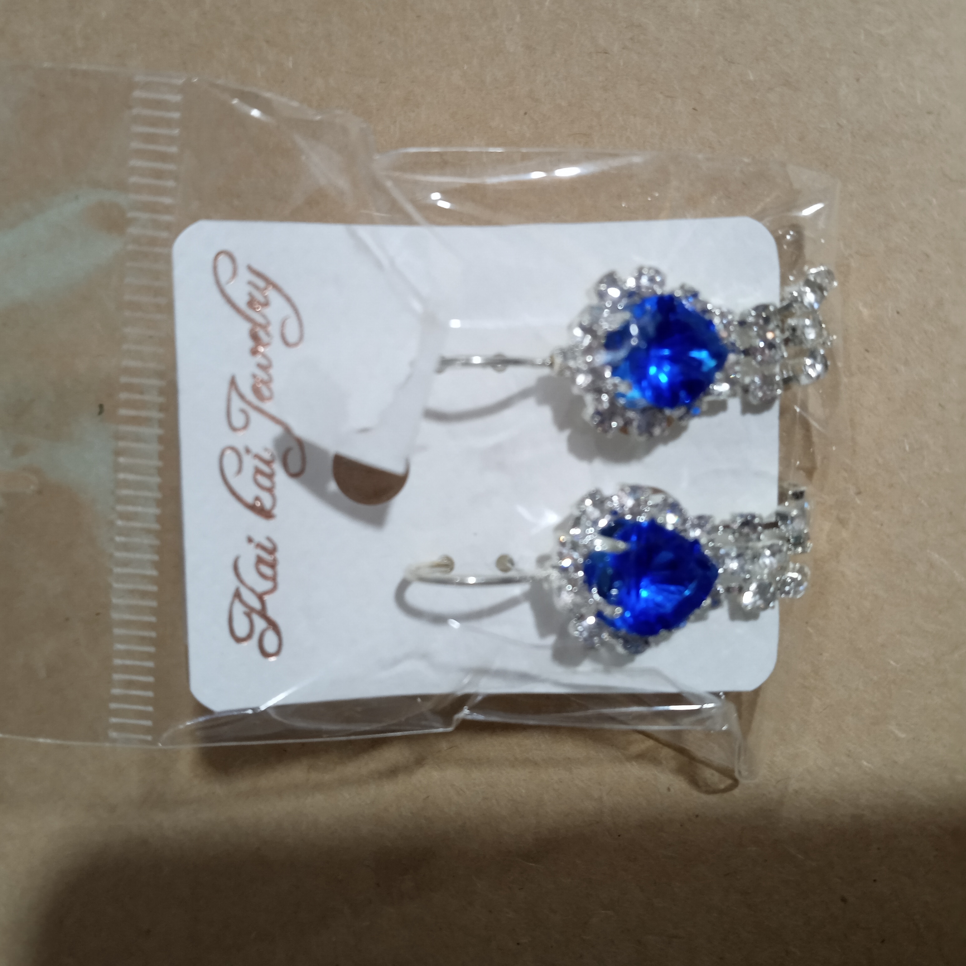 AROS CON PIEDRA AZUL EN FORMA DE CORAZÓN