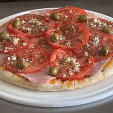 PIZA ESPECIAL COPADA DE QUESO DE PRIMERA JAMON TOMATE Y PIMIENTO DOS X
